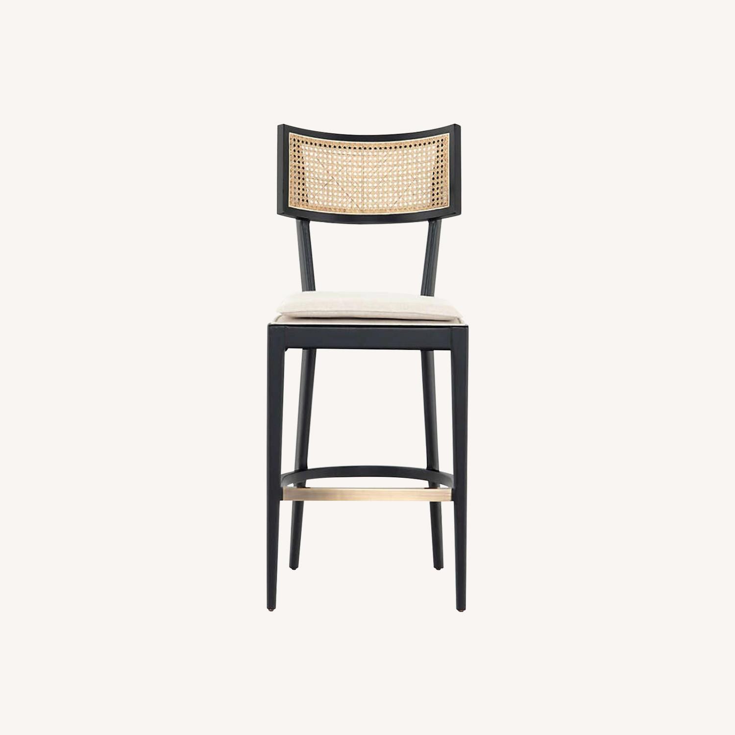 Crate & Barrel Libby Black and Natural Cane Stools - image-0