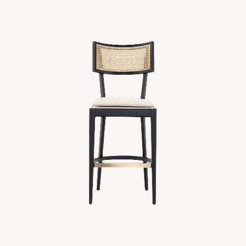 Used Crate & Barrel Libby Black and Natural Cane Stools for sale on AptDeco