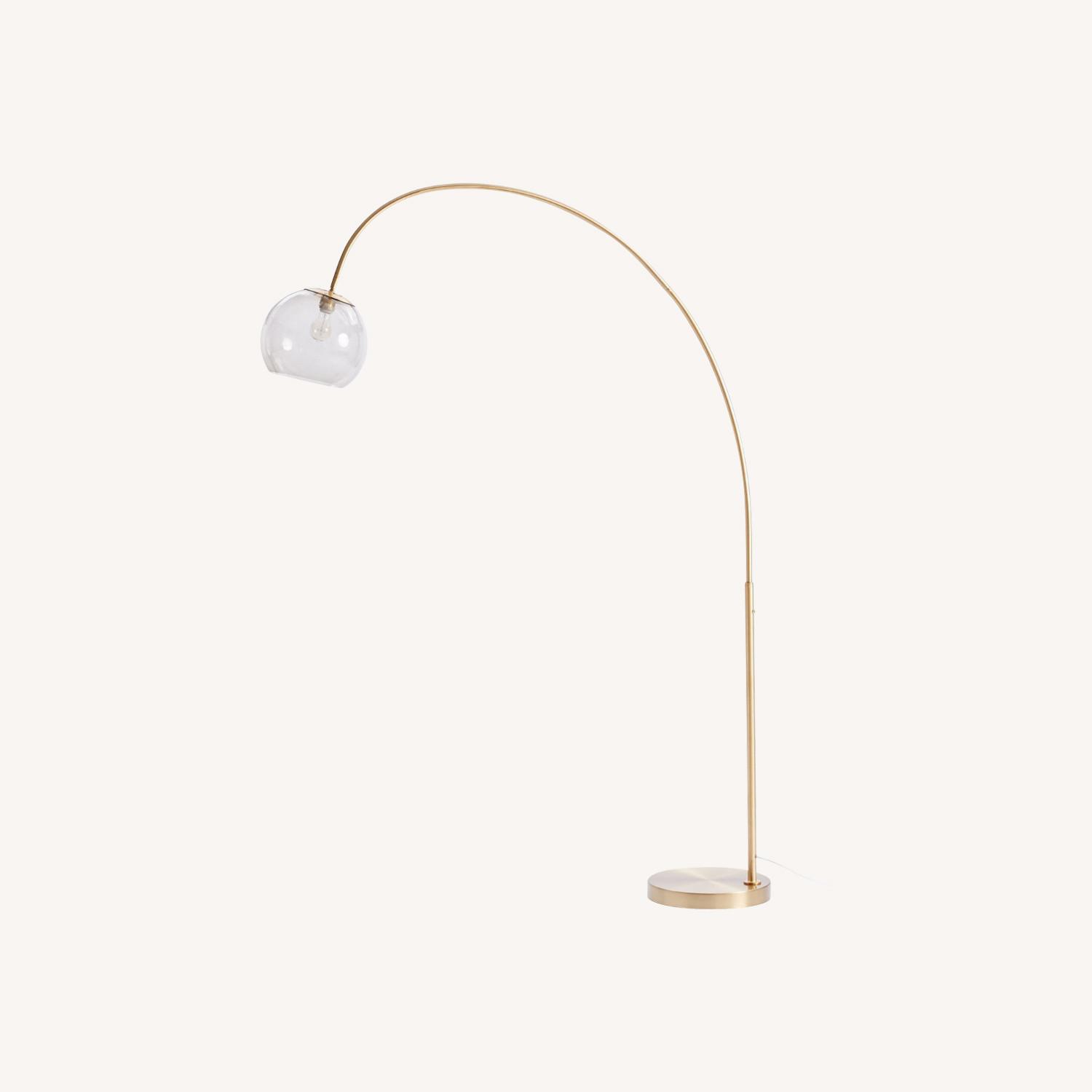 West Elm Overarching Brass Floor Lamp - image-0