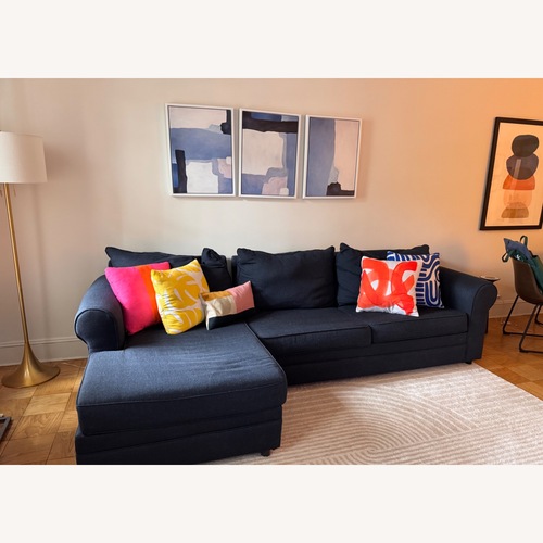 Used Bob's Discount Venus Navy Sectional for sale on AptDeco
