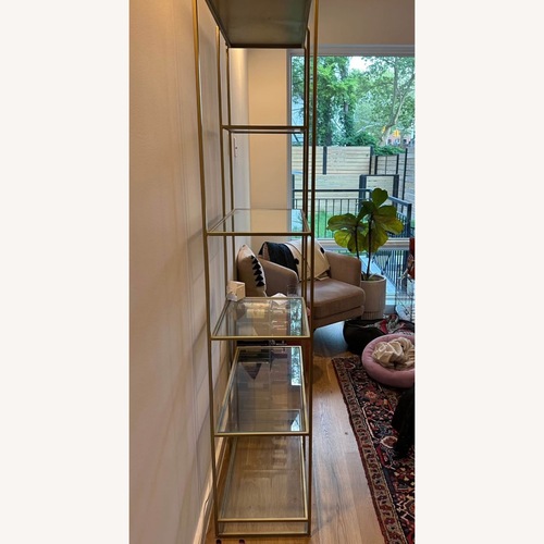 Used Crate & Barrel Estelle Gold and Glass Display Shelf  for sale on AptDeco