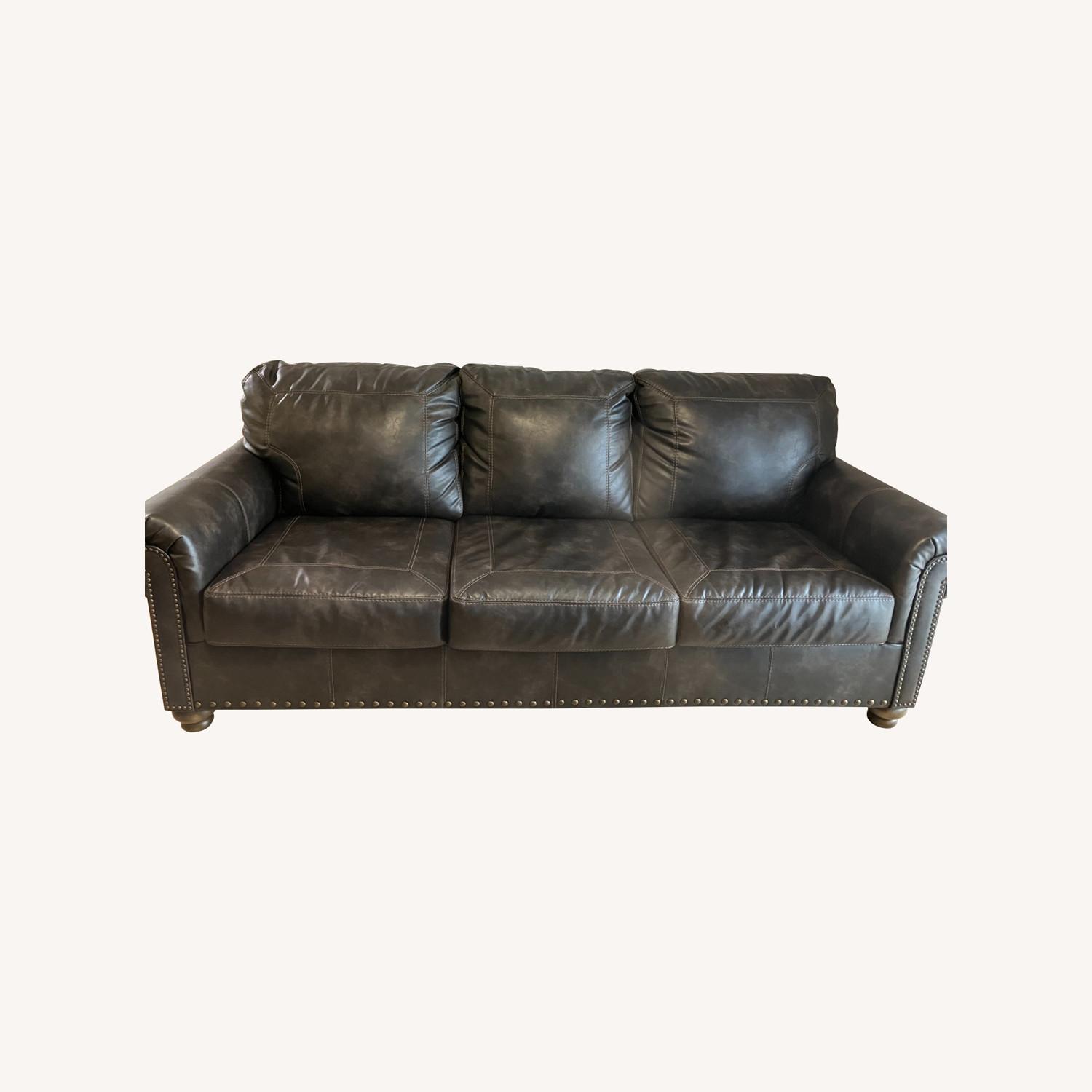 Ashley Nicorvo 3 Seat Dark Brown Sofa - image-0