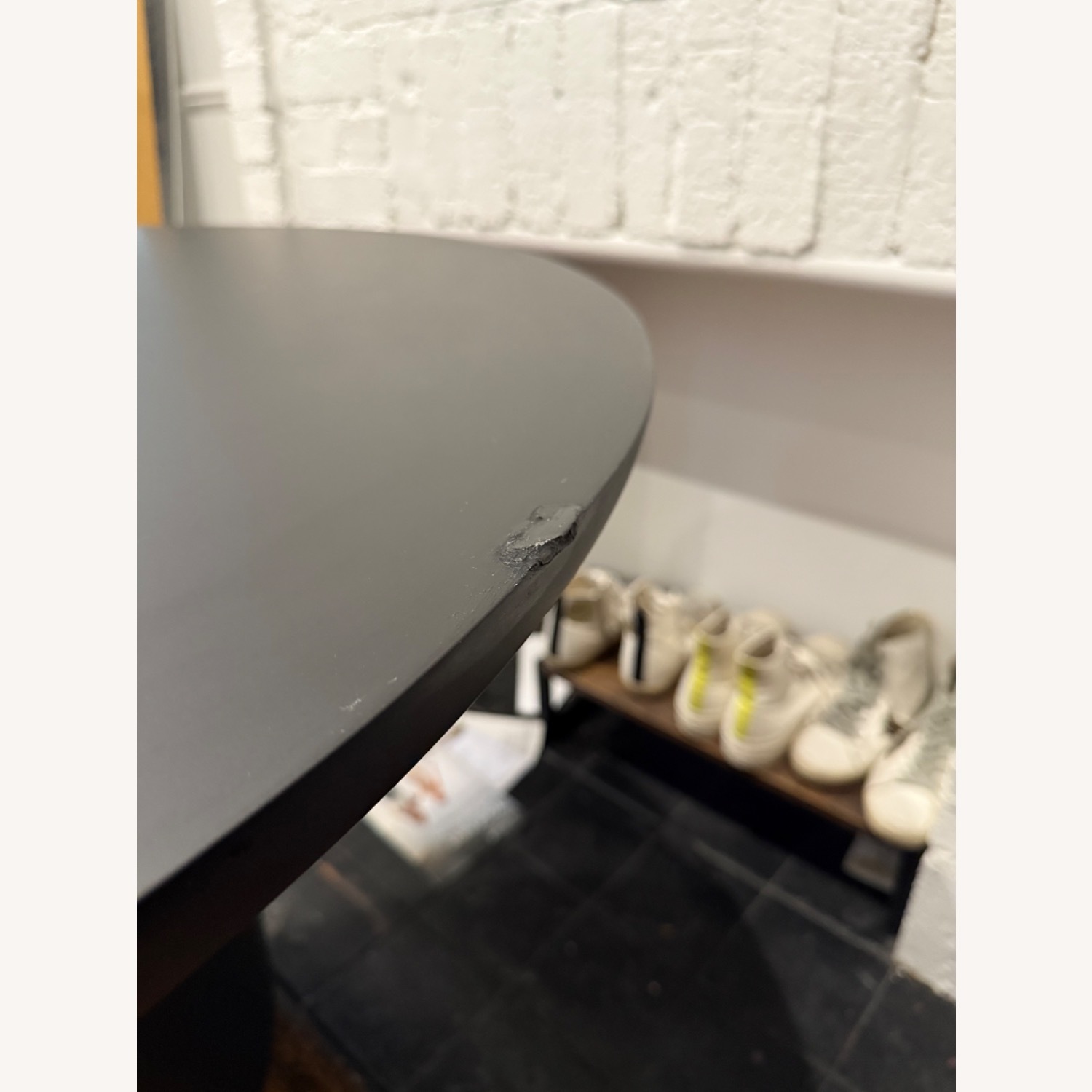 CB2 Lola 45" Round Black Concrete Dining Table - image-3