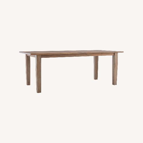 Used Crate & Barrel Basque Honey Dining Table for sale on AptDeco