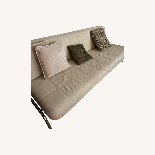Used Beige Tufted Sofa Futon for sale on AptDeco