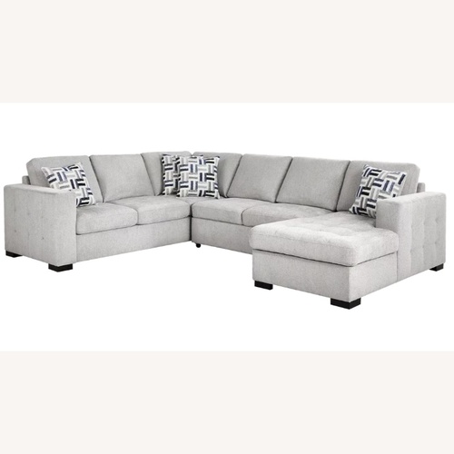 Used Large Grey Sectional with Cushion Covers for sale on AptDeco