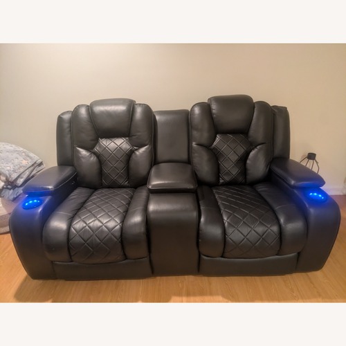 Used Panther Black Leather Power Reclining Loveseat  for sale on AptDeco