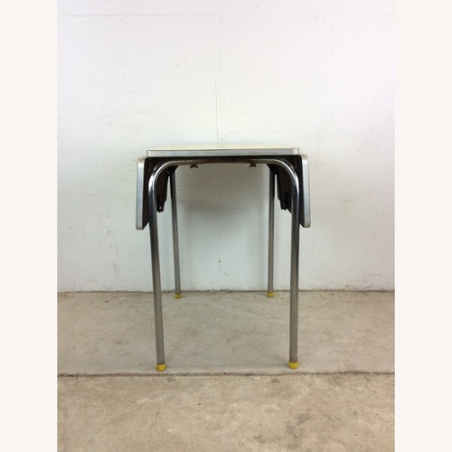 Used Mid Century Yellow Formica Top Table with 2 Leafs for sale on AptDeco