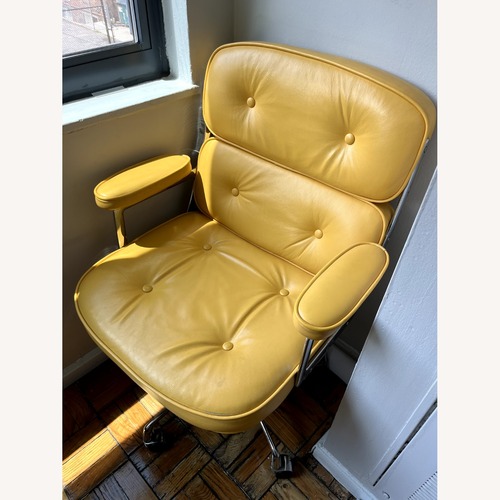 Used Herman Miller Eames Executive Chair in Yellow  for sale on AptDeco