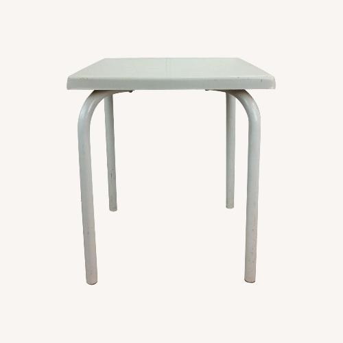 Used Mid Century Patio End Table with Fiberglass Top for sale on AptDeco