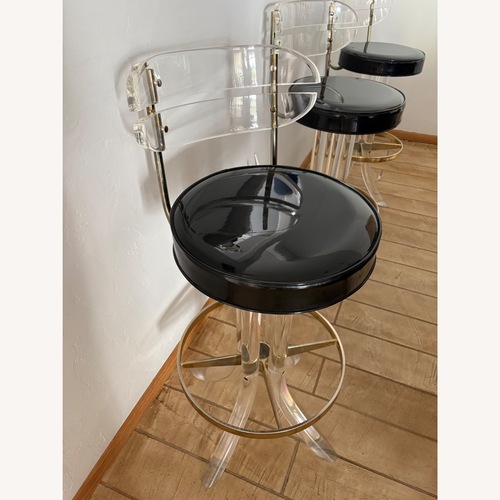 Used Mid Century Bar Stools Set of 4 for sale on AptDeco