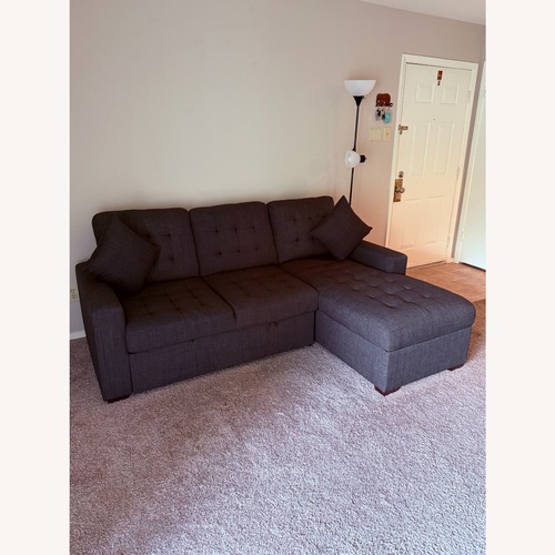Used Brynn 2-pc. Sofa Chaise W/ Pop Up Sleeper And Storage for sale on AptDeco