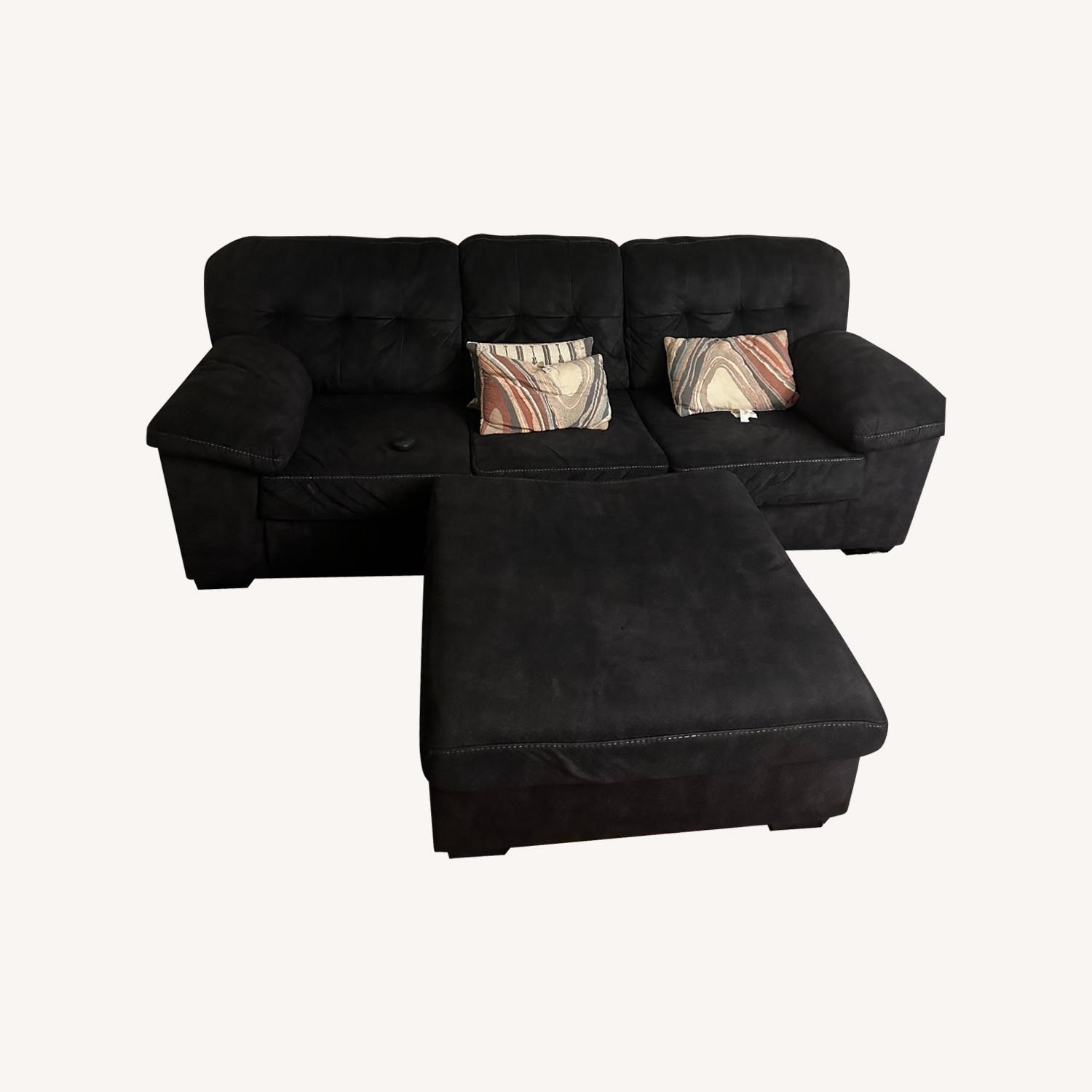 Ashley Furniture Charcoal Gray Sofa and Ottoman - image-0
