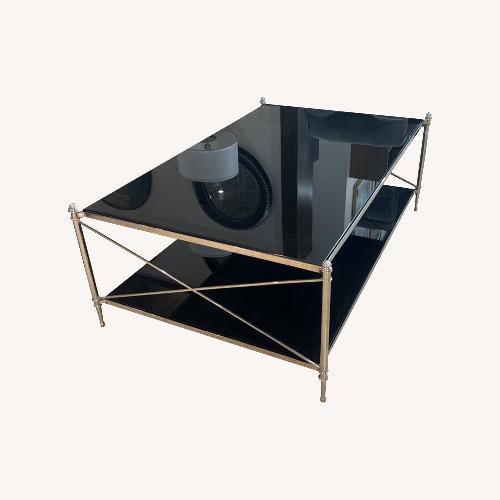 Used Chrome Cross Baes Frame W Glass Coffee Table for sale on AptDeco