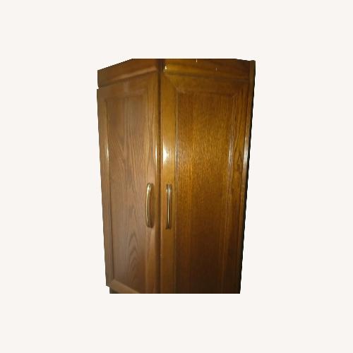 Used Wooden Tall Cabinet  for sale on AptDeco