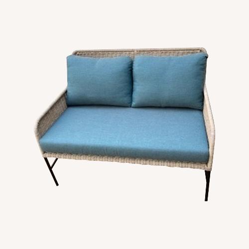 Used Pottery Barn Tulum Wicker Outdoor Loveseat Set for sale on AptDeco