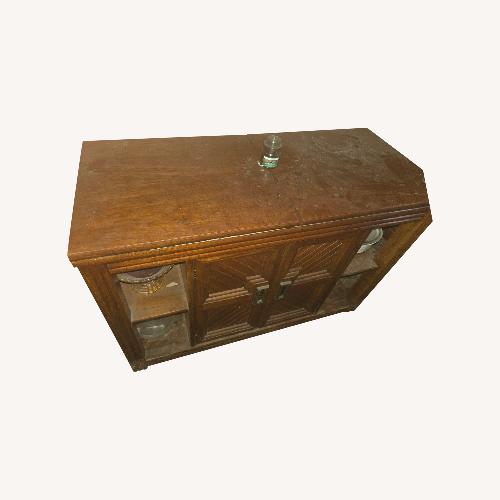 Used Wooden Buffet Center for sale on AptDeco