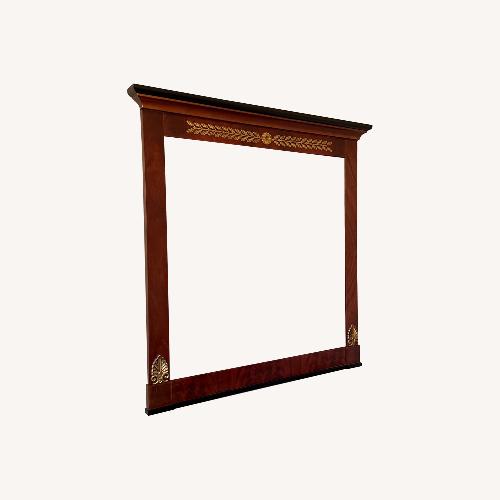 Used Mirror with Brown Wood and Black and Gold Accents for sale on AptDeco