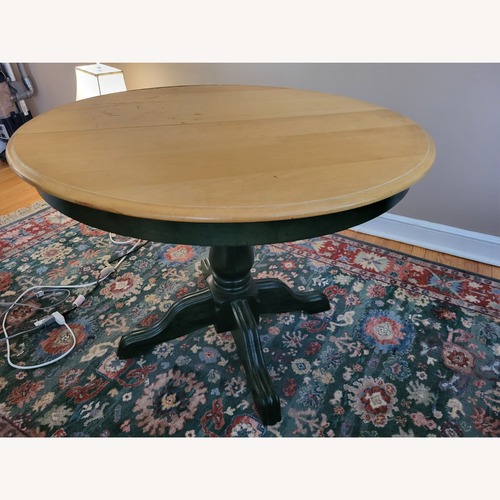 Used Natural Wood Round Kitchen/Dining Table for sale on AptDeco