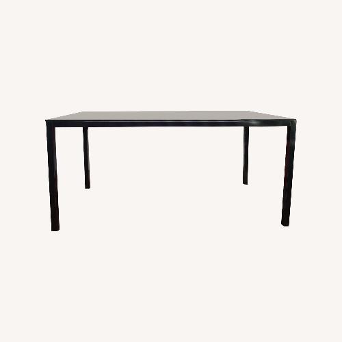 Used Rectangular Glass Top Dining Table for sale on AptDeco