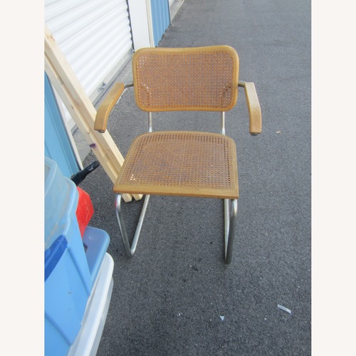 Used Vintage Rattan & Chrome Retro Chair Wood Arms for sale on AptDeco