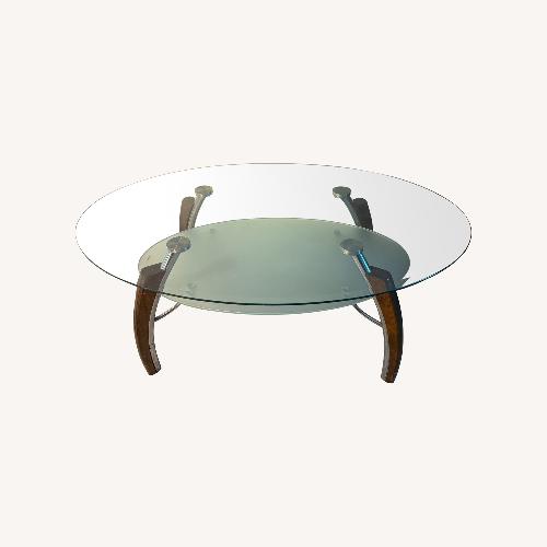 Used Glass Coffee Table with Wooden & Steel Legs for sale on AptDeco