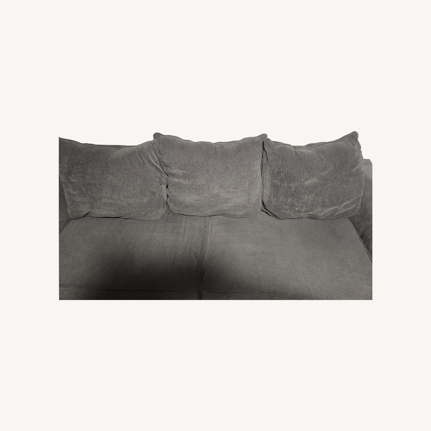 Rooms To Go Grey Couch - image-0