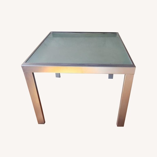 Used Extendable Glass Dining Table for sale on AptDeco