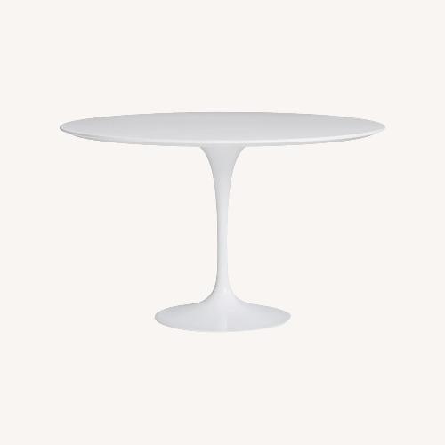 Used Knoll Saarinen White Tulip Dining Table 47" for sale on AptDeco