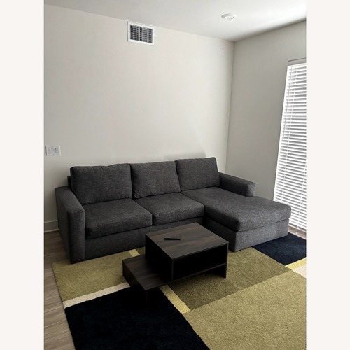 Used Living Spaces Pewter Gray Sectional for sale on AptDeco