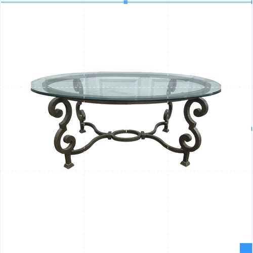 Used Wrought Circular Glass Table  for sale on AptDeco