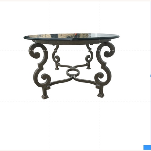 Used Wrought Circular Glass Table  for sale on AptDeco