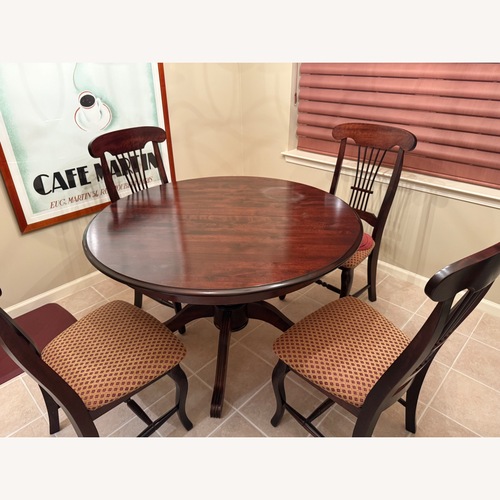 Used Ethan Allen Cherry 48" Round Table w 4 Chairs for sale on AptDeco