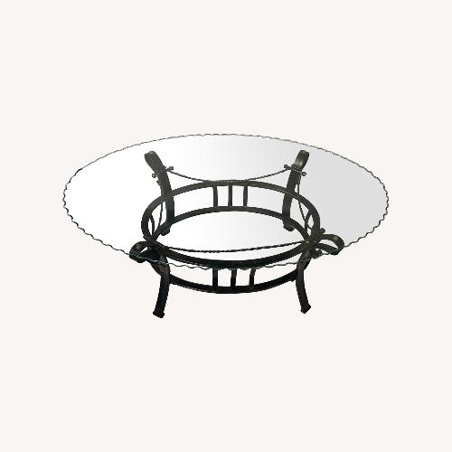 Used Oval Glass & Metal Base Coffee Table  for sale on AptDeco