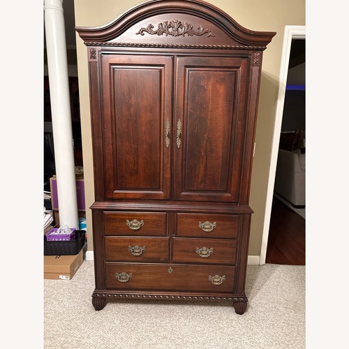 Used TV Armoire for sale on AptDeco