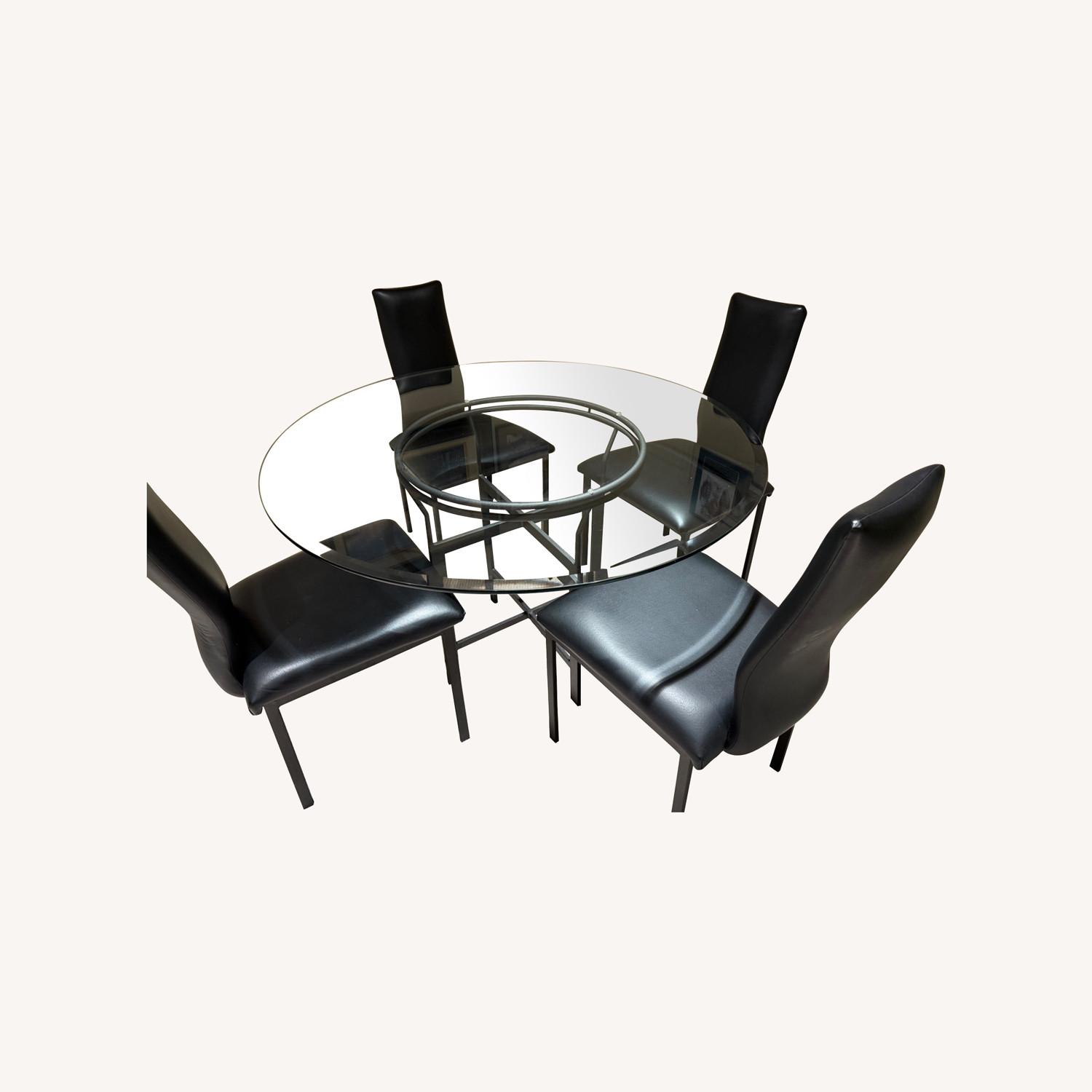 Glass Dining Table with 4 Black Chairs - image-0