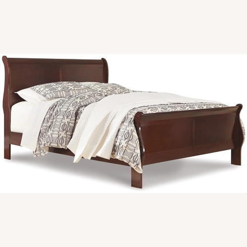 Used Raymour & Flanigan King Sleigh Bed for sale on AptDeco