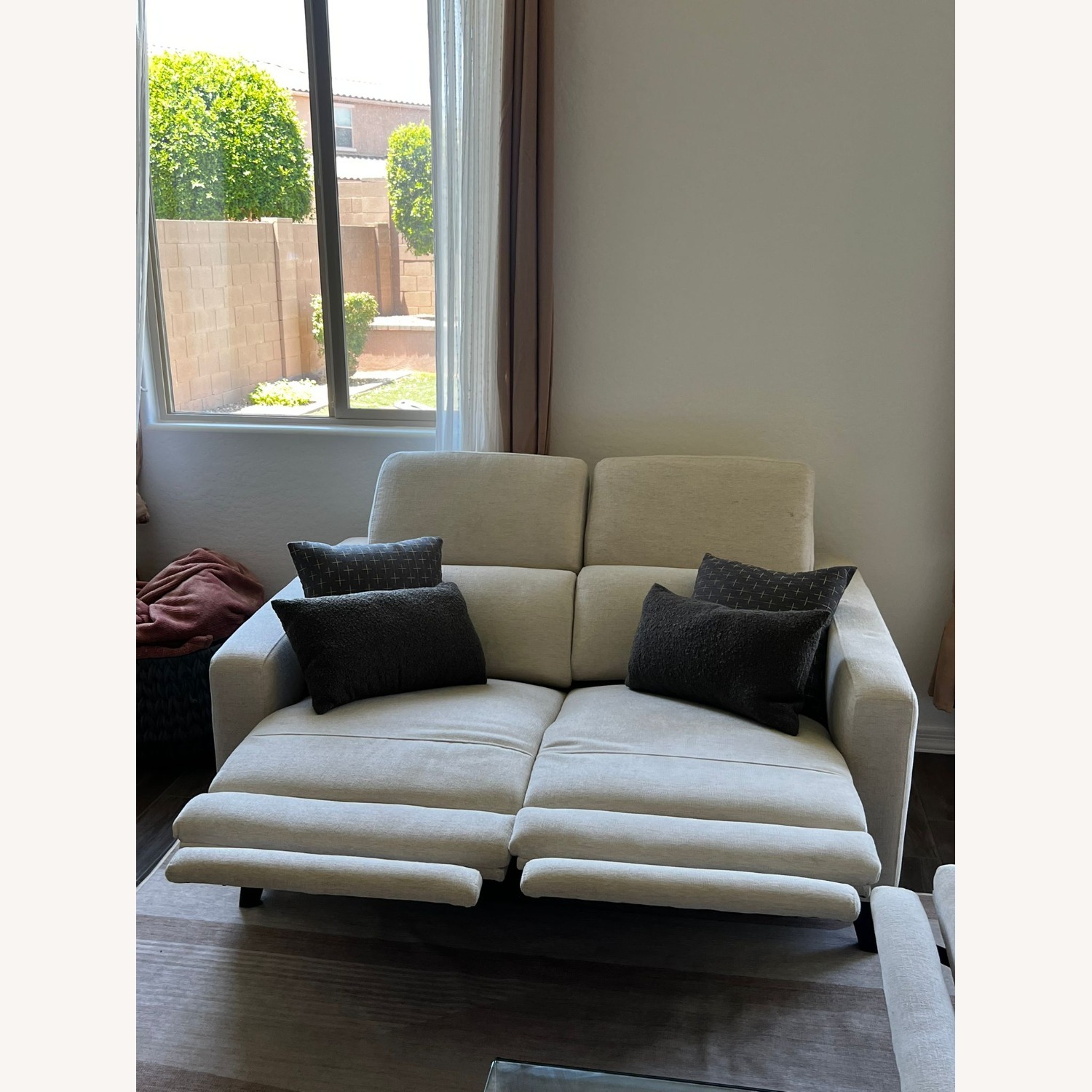 Living Spaces Reclining Love Seat with Power Headrest & USB - image-1