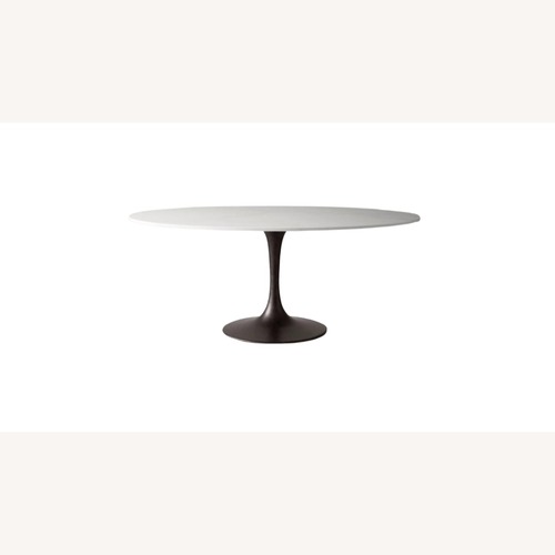 Used Williams Sonoma Home Tulip Oval Dining Table 70" for sale on AptDeco