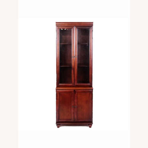 Used Bombay & Co. Cherry Bookcases w Interior Lights for sale on AptDeco