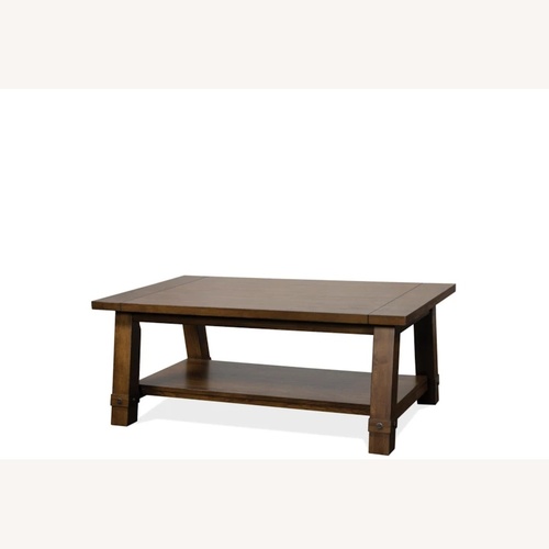 Used Randolph Brown Wood Rectangle Coffee Table  for sale on AptDeco