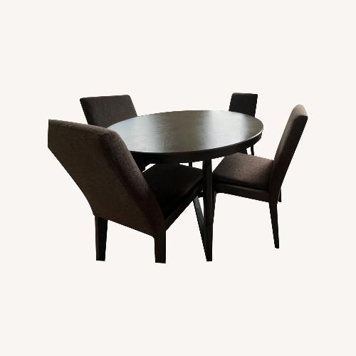 Used Raymour & Flanigan Modern Dining Table & Chairs for sale on AptDeco