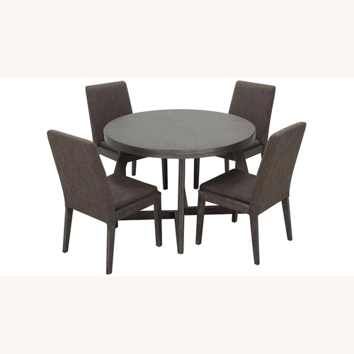 Used Raymour & Flanigan Modern Dining Table & Chairs for sale on AptDeco