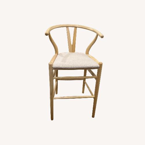 Used Hansel Upholstered Wishbone Counter Stool for sale on AptDeco
