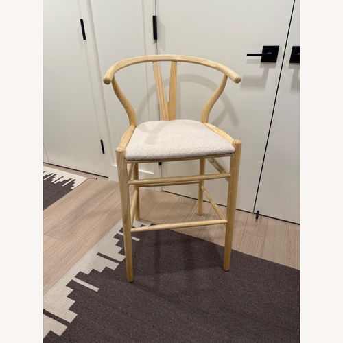 Used Hansel Upholstered Wishbone Counter Stool for sale on AptDeco
