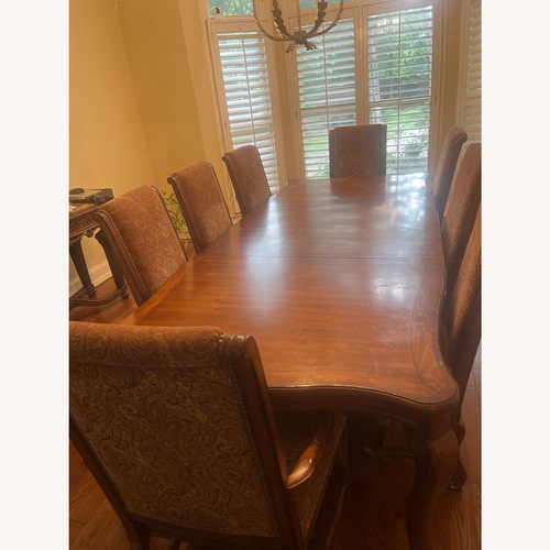 Used Large Dining Table with 8 Chairs for sale on AptDeco