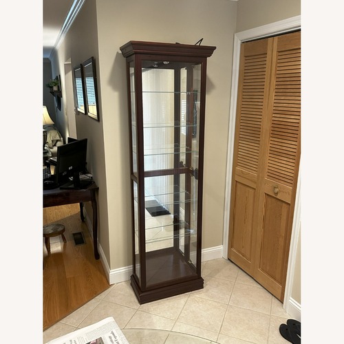 Used Charming Curio Cabinet  for sale on AptDeco