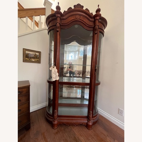 Used Pulaski Curio Cabinet for sale on AptDeco