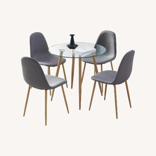 Used Glass-top Dining Table and Four Chairs  for sale on AptDeco