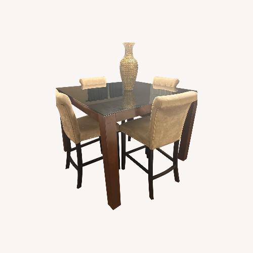 Used Ashley Furniture Glass Dinette with 4 Chairs for sale on AptDeco
